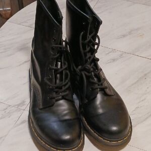 Black Leather Combat Boots with Lace-Up Design